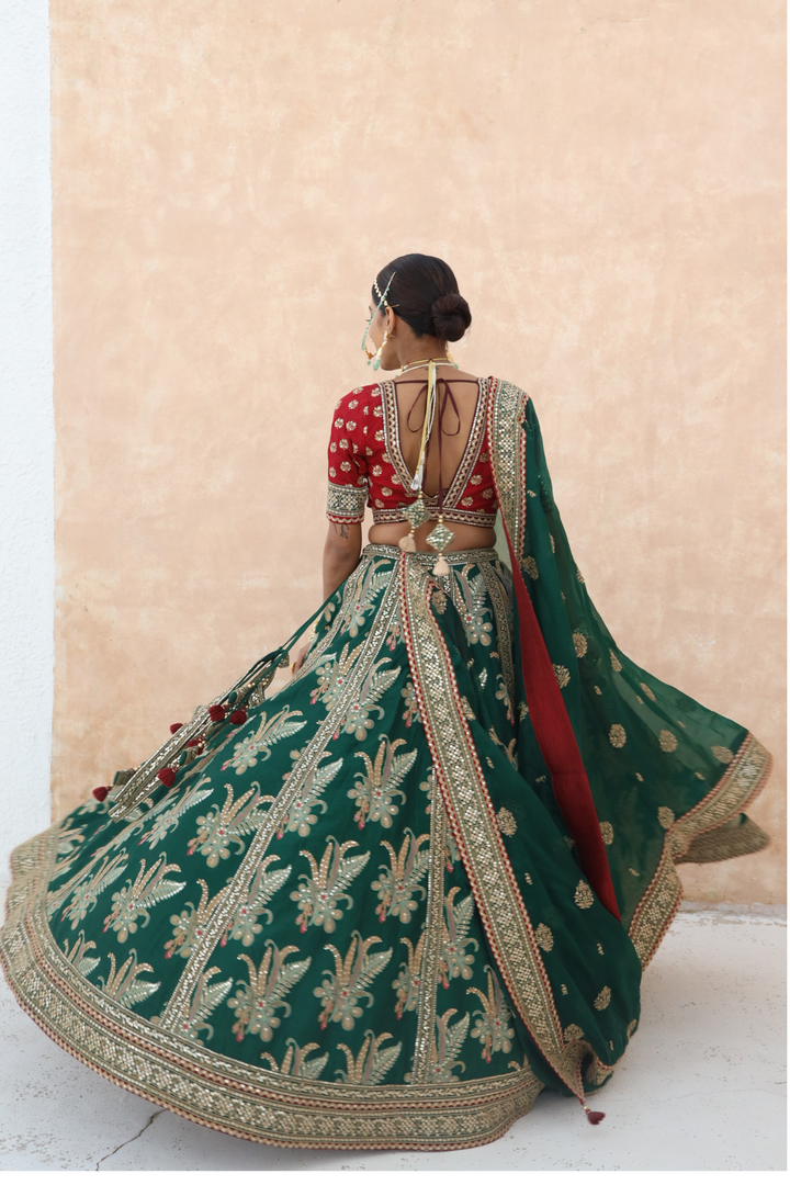 Raw Silk Lehenga Embellished with Gota Patti and Thread work