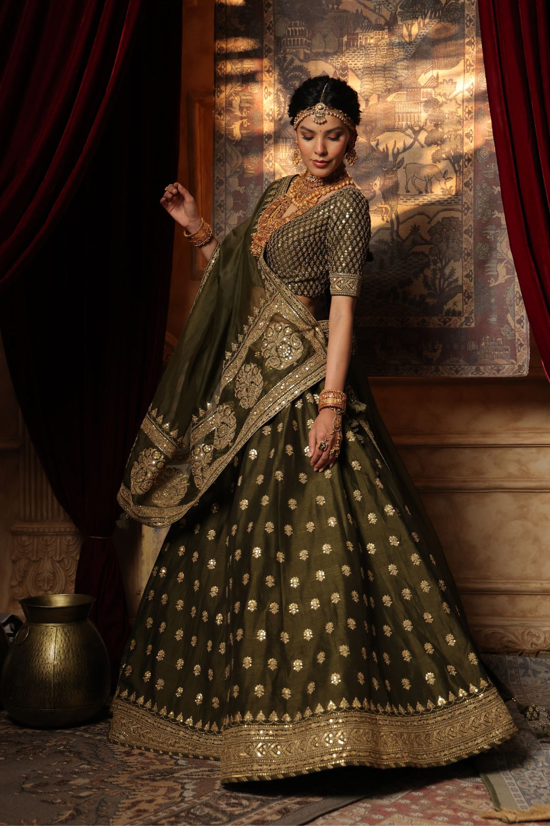 Silk Lehenga Embroidered with Aari and Thread work