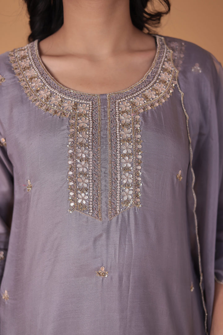 Silk Blend Suit with Thread and Zardozi work